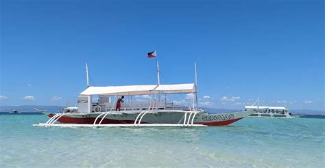 From Cebu: Island Hopping to 3 islands with BBQ lunch.